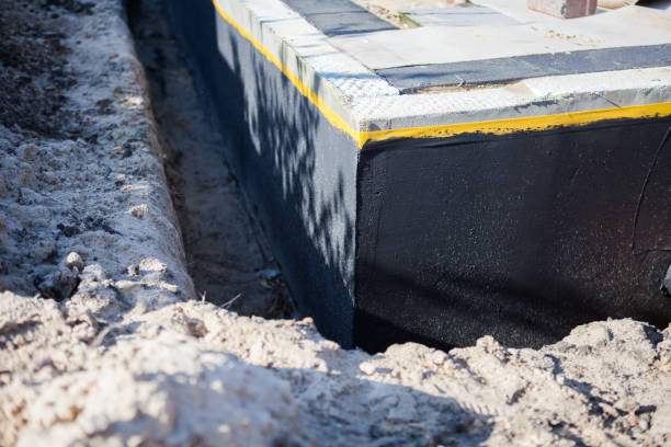 Professional Waterproofing technician working in Fultonham, OH